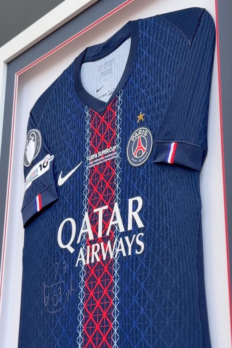Signed Paris Saint-Germain shirt framed with a navy and red double mount